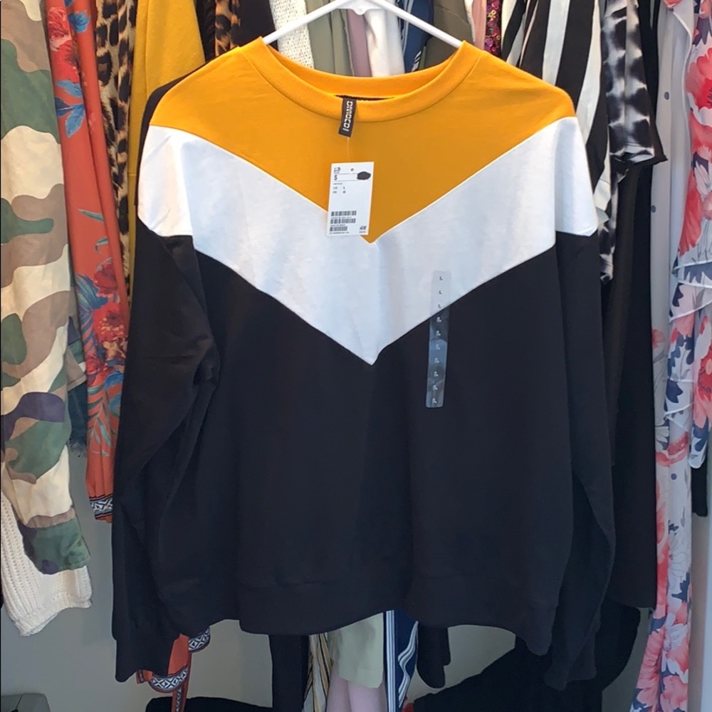 Black, yellow, and white sweater